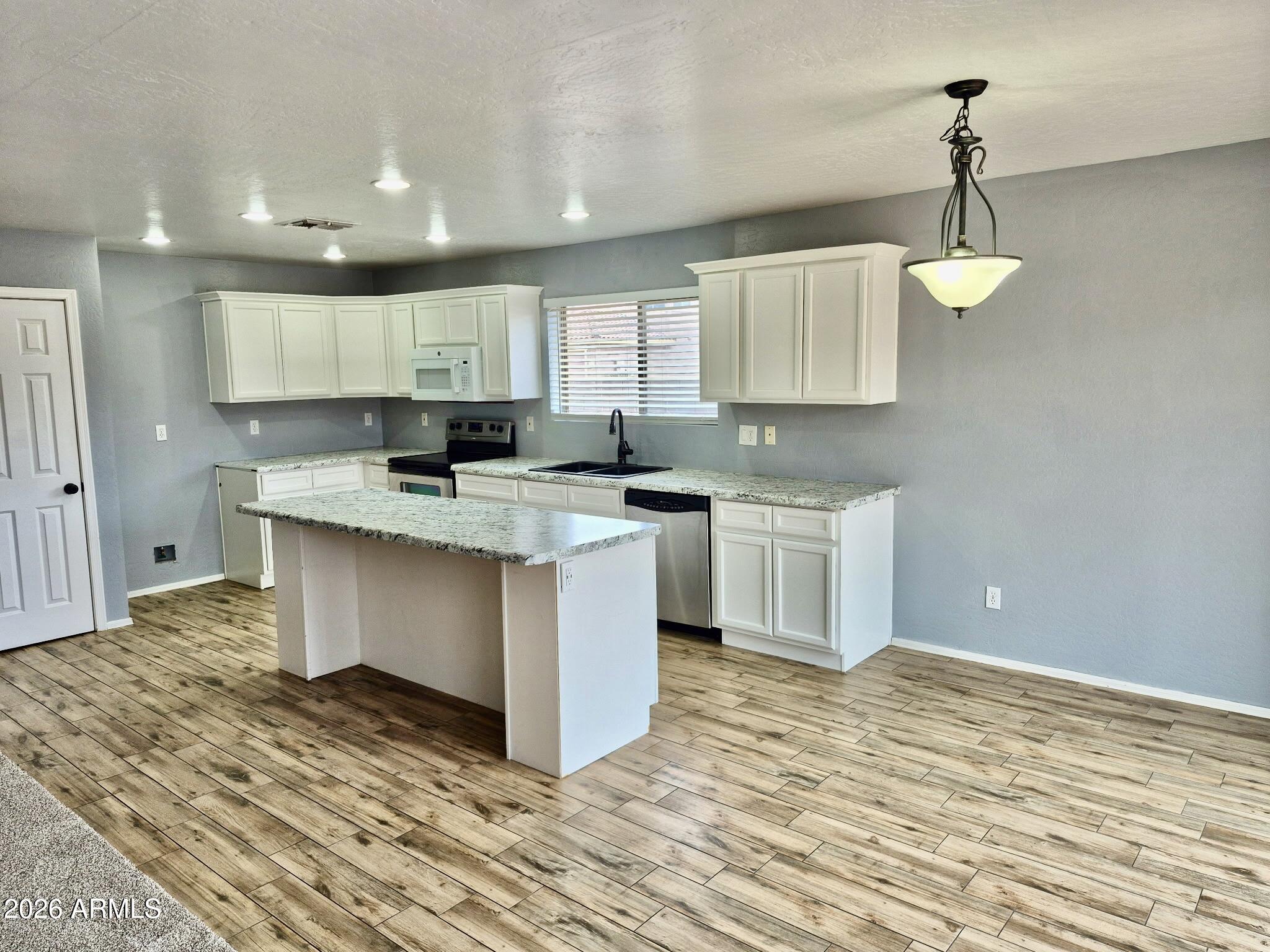 11533 E Quicksilver Avenue