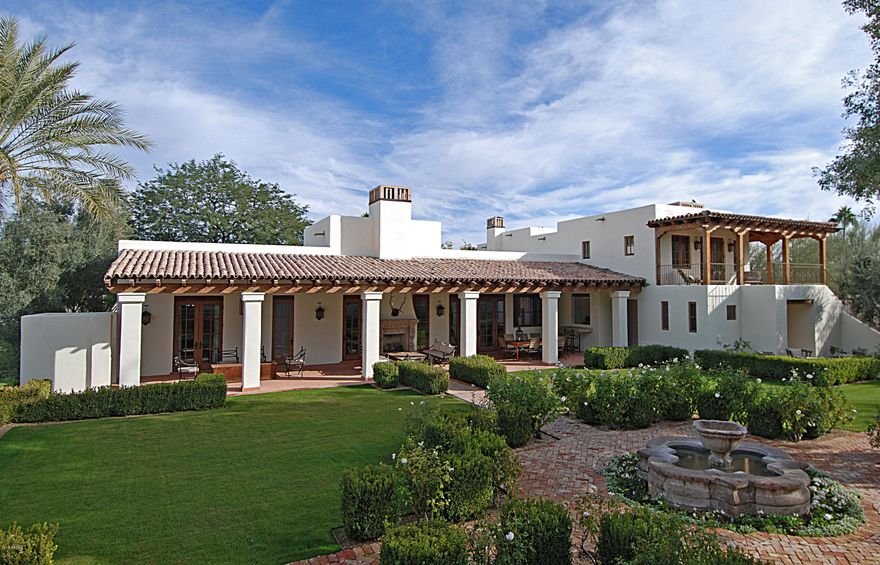 This breathtaking home is off the charts! It’s absolutely gorgeous with so much style and panache, you’ll find yourself dreaming of living there from the very moment you enter. Each and every room is loaded with exquisite finishes and dramatic design elements, and the floor plan is phenomenal. Quality oozes from each stunning space, and around every corner you’re treated to extraordinary taste and amazing style. The main residence offers room after room of thoughtful sophistication, and the guesthouse is just as impressive. Antique barn wood, French limestone, cream marble, custom cut canterra stone, waterworks fixtures and mesquite wood countertops just begin to tell the tale of the very rare and unique detailing. To say the grounds are magnificent would be to understate their elegance, and the mountain views are simply majestic. Designed by Candelaria, built by Desert Star, and landscaped by Berghoff, it's ever apparent that not a detail was overlooked in this impeccable estate!