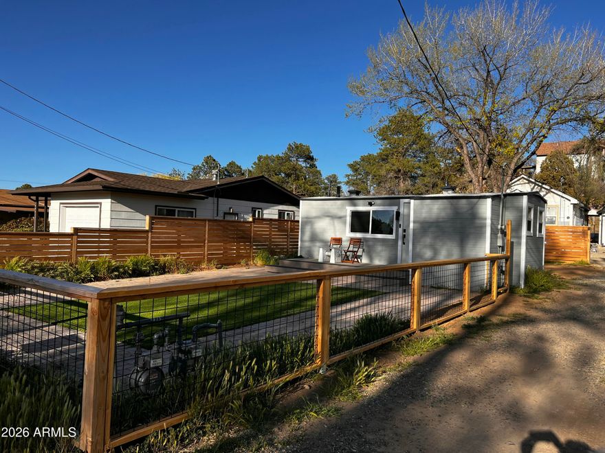 Charming Cozy Home Located 2 miles from Downtown, and just down the street from the rodeo. Presently used as a vacation home and Airbnb. Remodeled with New interior and exterior paint. New stainless steel stove, microwave and black refrigerator. Quartz countertop and backsplash, wine glass rack, shiplap accent walls and farmhouse shelves for that modern look. Beautiful barn door into your bedroom, Large Composite front deck to enjoy your morning coffee, Beautiful Brazilian Cumaru wood fence, Pavers and Artificial grass add to the properties curb appeal. EV charger making vehicle charges easy! Property is currently being used as short term rental.