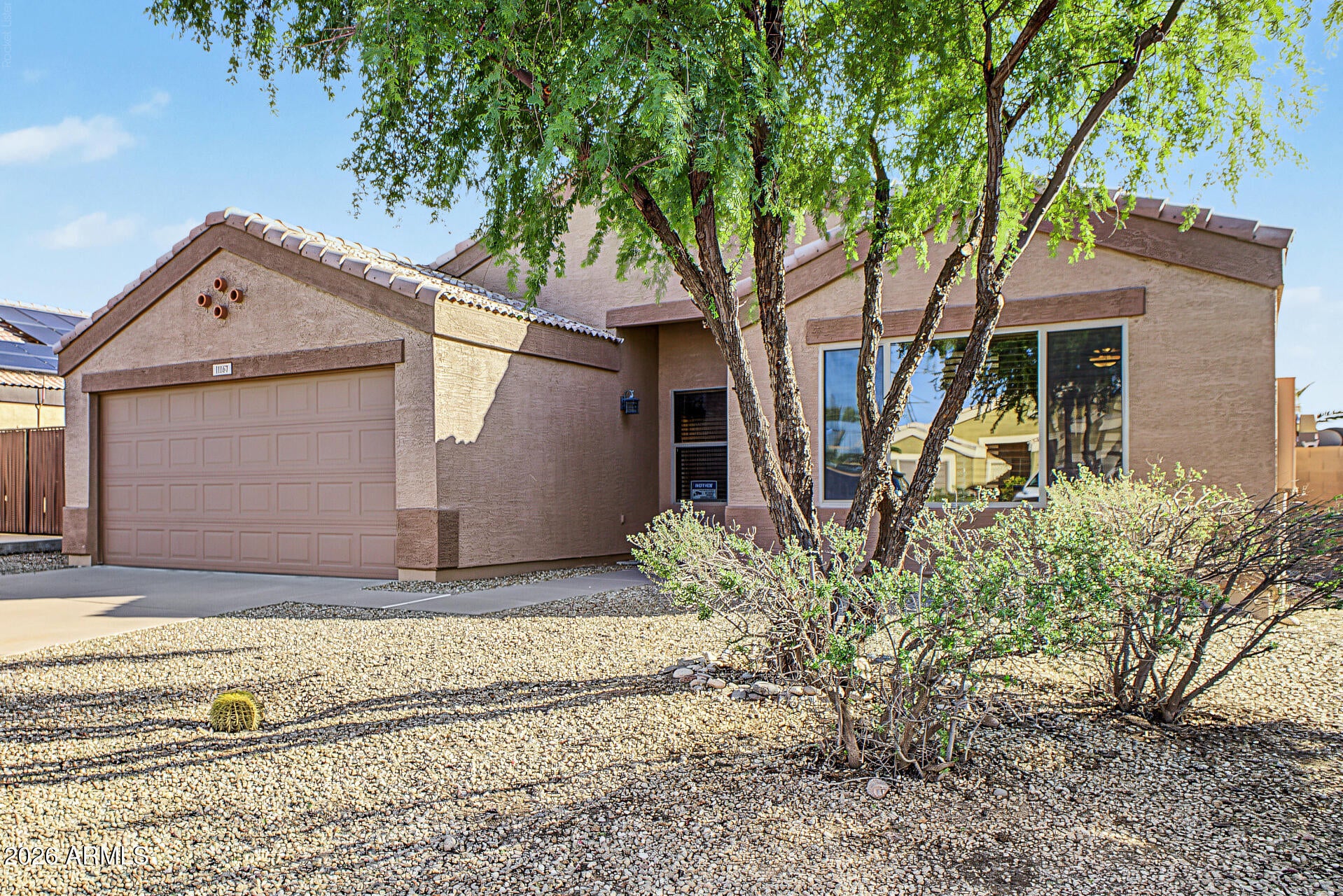 11167 W HARMONT Drive
