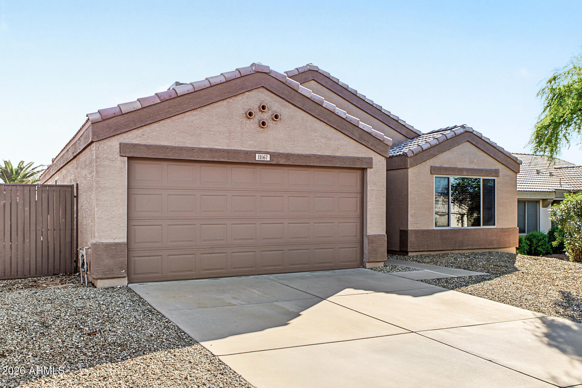 11167 W HARMONT Drive