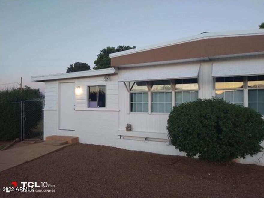 Attention investors!!!Well kept 2 bedroom 2 bath mobile home an 1/3 of an acre in Huachuca City. Just minutes from Sierra Vista. This property offers 4 sheds, one of which is 24''x12''and would make a beautiful workshop. This home has updated plumbing, and updated bathrooms. Beautiful views and great yard with shade trees and a fenced garden plot. Has its own well. Property to be sold as-is. Come see ! Bring all offers!