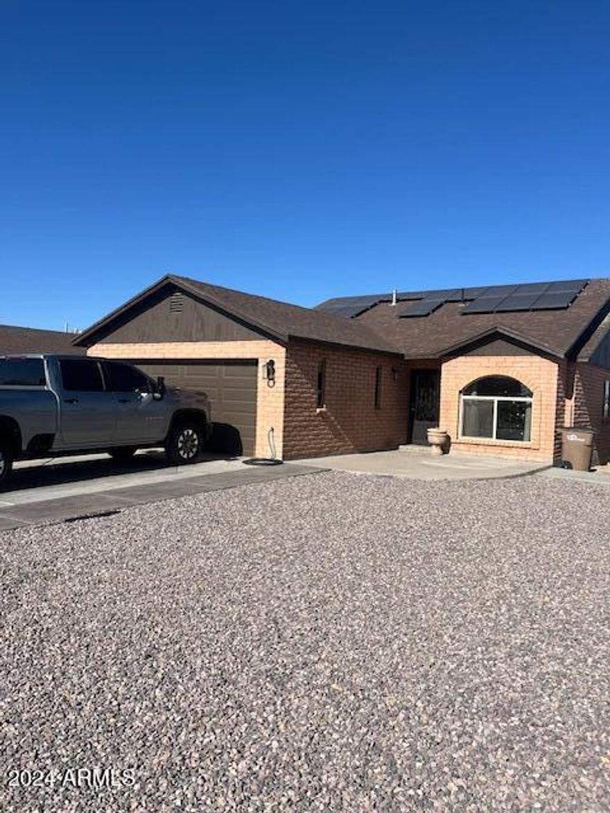Solid brick home on a corner lot. Recently renovated. 2 car garage, custom entry door, custom wood shutters & tile through out. Spacious 3 bed 2 bathroom home.