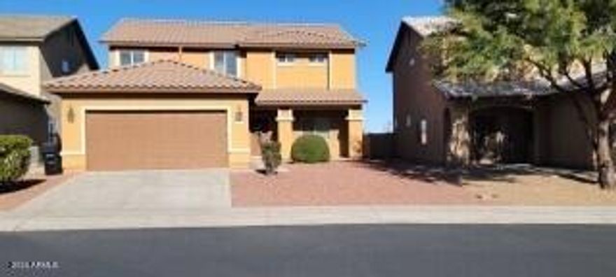 If you are looking for that rare 5 or 6 bedroom home, look no further, This lovely home has many upgrades including granite counters through out the baths and kitchen. There is a custom neutral paint scheme as well the flooring colors. There are 2 bedrooms downstairs with the rest upstairs. There is a full bath downstairs as well as 2 full baths upstairs. You will love the master suite. There is a balcony with a view of the walking path and open area behind the house as well as a view of the mountains. There are 2 closets including 1 walk in and 1 regular. The master bath has a shower and separate garden tub as well as dual sinks.   No Subject to offers or escalation clause offers will be entertained.