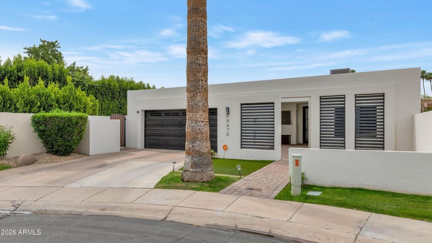 This delightful home has been completely remodeled with excellent taste. Every room has a fresh modern vibe yet exudes warmth and comfort. The beautiful kitchen has sleek custom cabinetry, a marble covered island and stainless-steel appliances. There are both formal and informal dining areas, the family room is gorgeous, and there's an awesome detached structure that's perfect as a pool house, teen room or private home office. The impressive bedrooms and baths feature a primary suite with a large walk-in shower and free-standing soaking tub. Sliding doors lead to an extended covered patio, shaded dining area, firepit, and lovely pool creating a fabulous setting for the family and numerous entertaining options as well. Located in a great pocket of McCormick Ranch, this home is perfect