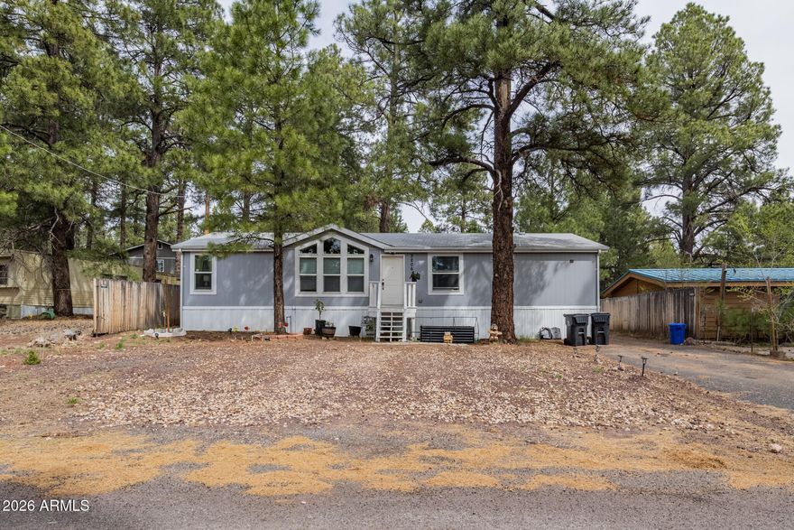 Gorgeous home in Kachina Village! Spacious open & fenced back yard on nearly a 1/4 acre lot. New gutters & deck is refinished. Inside features open concept w/split floor plan & vaulted ceilings. Updated flooring & newly installed window AC units. Interior fully painted in 2022. Newer ceiling fans & dining lights. Kitchen features staggered cabinets w/kitchen island. Spacious Master Suite with dual sinks & walk in closet. Separate laundry room & outside patio deck! This one is a MUST SEE!!