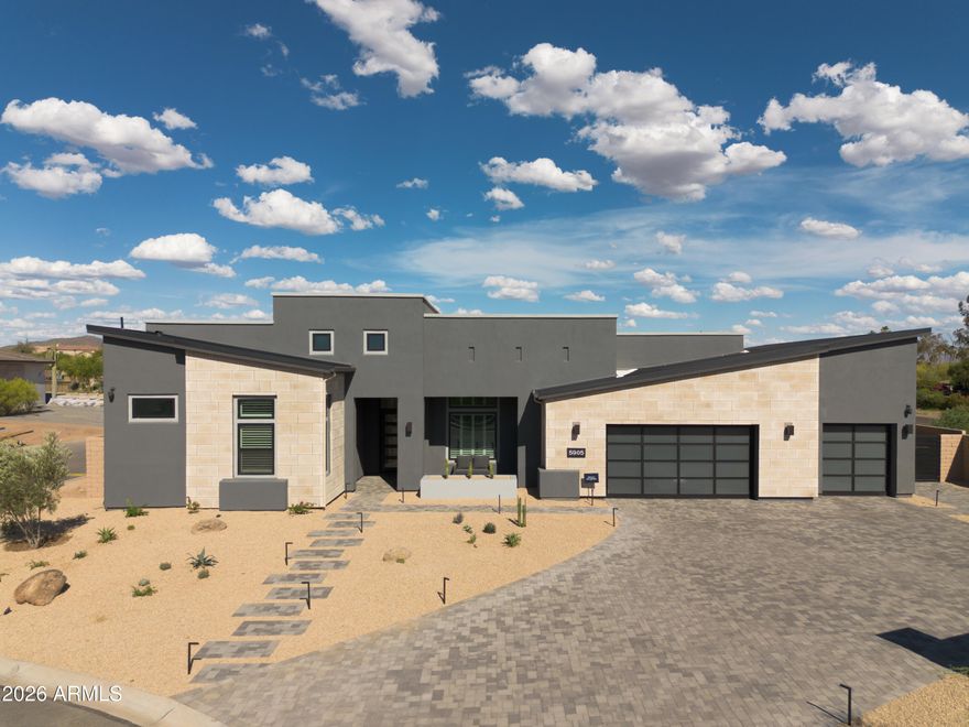From the moment you enter, soaring ceilings, walls of glass, and wide-plank white oak floors create a sense of light, scale, and effortless sophistication. Designed around a true great room concept, the main living space opens effortlessly to the covered patio, creating a natural extension of the home and maximizing Arizona's year-round indoor-outdoor living. The kitchen is the centerpiece, both functional and beautiful, anchored by a statement island that naturally becomes the gathering place. The primary suite is a private escape, designed for quiet mornings and relaxed evenings, with a spa-inspired bath, soaking tub, and an expansive walk-in closet. A separate guest suite offers the kind of flexibility today's buyers expect, with its own living space, bedroom, and full bath - ideal for hosting, multi-generational living, or creating a private retreat within the home. Built in Fall of 2025, this Kartchner model in Sonoran Trails offers a rare opportunity to step into a home that feels brand new--without sacrificing time, energy, or design vision. This is what modern luxury looks like, clean lines, thoughtful design, and a home that lives as beautifully as it looks. All of it, without the wait.