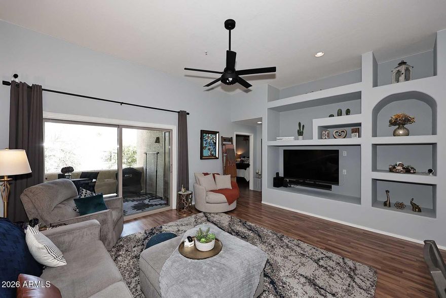 BEAUTIFUL UPSTAIRS CONDO with UPGRADES!
This 2 bedroom, 2 bathroom home w/a 1 car garage offers comfort, style & a prime location. Kitchen & bath cabinets have been professionally painted, and paired with Samsung appliances, including an oven with a built-in air fryer.  Enjoy quartz countertops, a stylish newer backsplash, InSinkErator garbage disposal, and an added breakfast bar.  Additional improvements include newer windows and sliding glass door, ceiling fans, a custom front screen door and  a newer garage door opener.  You will appreciate the abundance of wood-look tile flooring (existing plant/water damage in dining room floor by previous owner; extra flooring conveys). HOA replaced the roof in 2025 for added peace of mind, and in 2026 HOA to reseal garage roof.  See MORE... Relax in the solar-heated community pool and take advantage of the convenient location of this condo which is near shopping, hiking trails and the world-famous fountain.