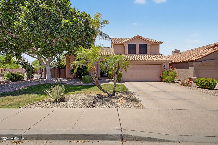 This isn't just a home; it's a high-end retreat that redefines the ''move-in ready'' standard. You get the sophisticated custom-home aesthetic-from curated designer finishes & vaulted ceilings to two brand-new A/C units installed in 2026 - without the custom price tag. Daily life centers around a stunning kitchen & resort-style backyard oasis, complete w/ a private pool, built-in BBQ, & lush desert landscaping designed for seamless indoor-outdoor entertaining. Between the romantic primary suite w/ direct patio access & the versatile great room w/ cozy fireplace, every square foot delivers functional luxury. Situated within minutes from world-class golf, mountain trails, paddle boarding on the river & more. Easy 202 loop access. You don't need a custom home to live the refined Mesa lifestyl Flexible loft can easily serve as an office or TV area. Venture to the spacious backyard oasis, complete with a covered patio, garden fountain, exterior fireplace, built-in BBQ, sparkling pool, and refreshing spa. Don't let this rare abode slip by!