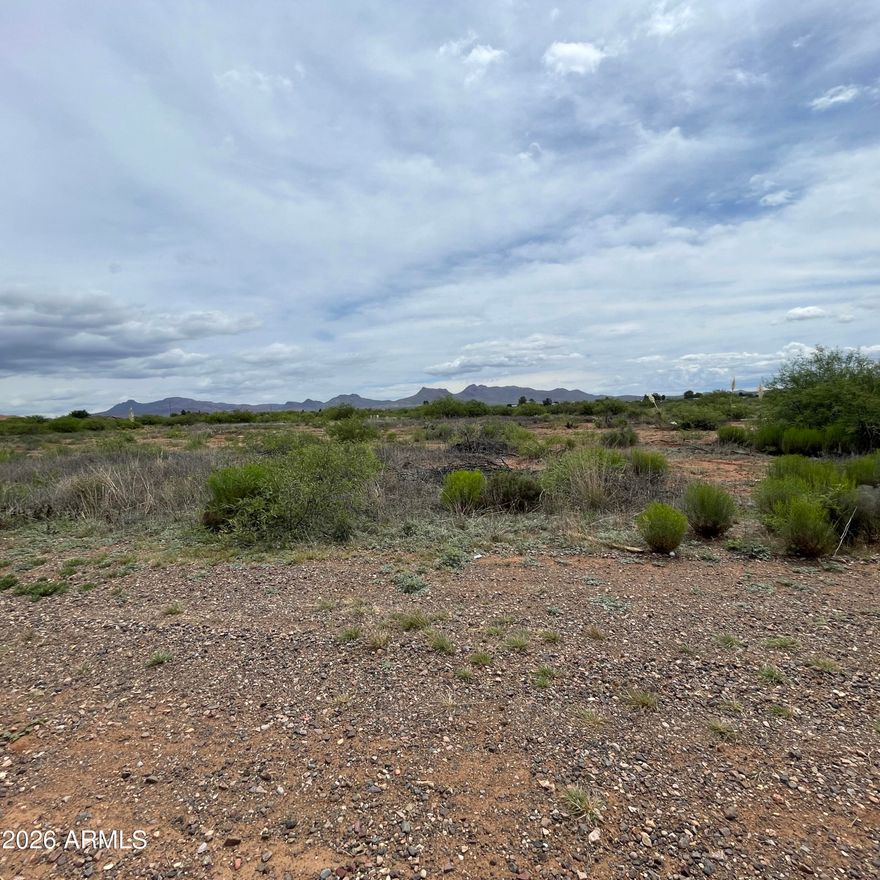 2 lots for sale totaling 3 acres, one 2 acre parcel and one 1 acre parcel.  Gated location close to golf course and fairgrounds, this space provides an ideal scenario for rural living with proximity to town.   All utilities are located at E Golf Course Rd.  No improvements have been made to either lot.   Parcel numbers  41010001S and 41010001M included in sale.  Parcel number 41010001S has a utility easement along the long end of the property, easement does not convey.  Parcel size on county records for 41010001S lists 3.195 acres, one acre includes utility easement that does not convey.