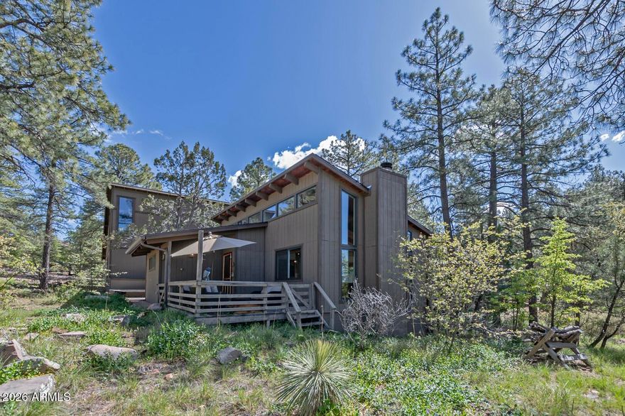Charming cabin bordering Tonto National Forest with breathtaking views and abundant wildlife. Expansive windows and stunning wood cathedral ceilings fill the home with natural light and bring the outdoors in. Enjoy peaceful forest living with a deck and patio on two sides--perfect for relaxing or entertaining. 
Features include 1 bedroom, 1 bath, and a cozy loft for additional sleeping space. Detached oversized garage with loft above offers flexible use for workshop, studio, guest space, or storage (buyer to verify with Gila County).
Recent updates: new roof on cabin and garage (Feb 2026, warranty), Milgard Low-E windows/sliders (2021), custom wood blinds (2023), permanent loft stairs with storage (2019), exterior paint (2022), interior paint (2023). Seller is a licensed AZ agent Furniture and Misc. Items to convey.