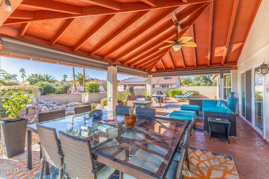 San Simeon Extended model with NO HOA restrictions in highly sought-after Sun City West! This meticulously maintained and extensively upgraded 2-bedroom home features a den/office that can EASILY be converted into a 3rd bedroom. Split floor plan offers two master suites for added privacy. Interior highlights include crown molding, new baseboards, fresh paint, removed popcorn ceilings, luxury vinyl plank flooring, new tile, plantation shutters, and a floor-to-ceiling stacked stone fireplace. Updated kitchen boasts CraftMade cabinets, quartz counters, wet bar with wine chiller, and new Samsung appliances. Updated baths, new 2025 roof and Carrier 5-ton heat pump, Simonton windows, and roll-down patio shades. Seller to convey selected furniture with the sale of the home. A must-see!
