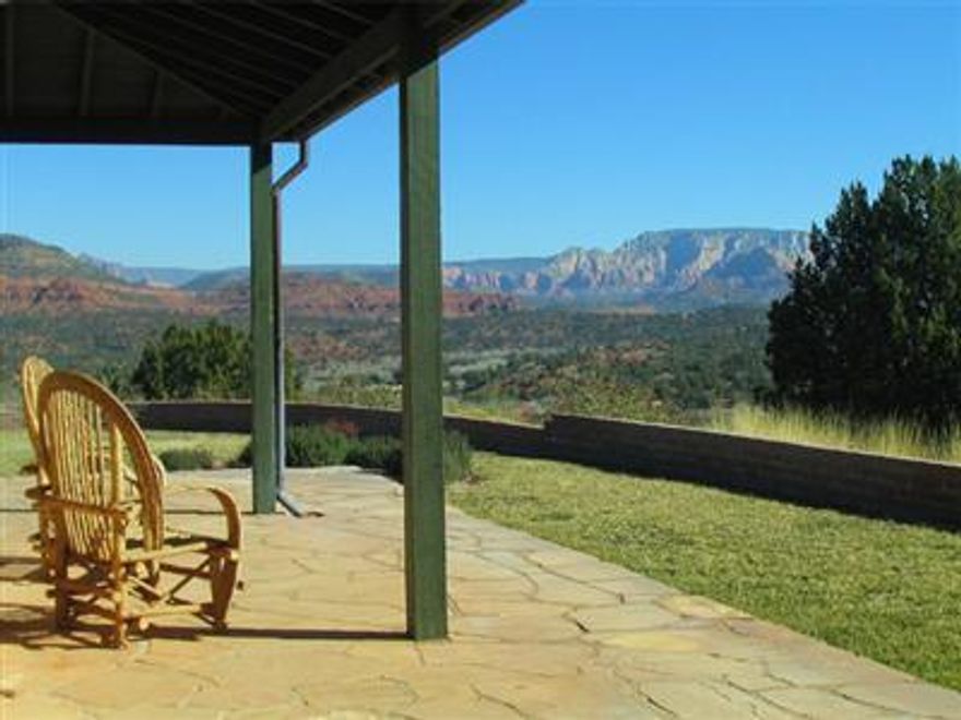 Perhaps the most beautiful hilltop setting in Northern Arizona, bordering extensive U.S. Forest Service land and w/towering red rock views and vistas in every direction from this breathtaking 5-acre hilltop perch. Add'l acreage is also available, allowing for the creation of up to 18+- acres in a true private hilltop estate, making this an even more unique site in Sedona. The lovely 3 bedroom/2.75 bath home has been fully renovated and beautifully updated while retaining it's original 1951 year-built classic Sedona character, with flagstone floors, very high beamed ceilings, huge windows capturing the magnificent views, broad flagstone patios and a hilltop setting like no other. Eagle Mountain Ranch is one of Northern Arizona's most exclusive enclaves,... (see supplement for full remark Perhaps the most beautiful hilltop setting in Northern Arizona, bordering extensive U.S. Forest Service land and w/towering red rock views and vistas in every direction from this breathtaking 5-acre hilltop perch. Add'l acreage is also available, allowing for the creation of up to 18+- acres in a true private hilltop estate, making this an even more unique site in Sedona. The lovely 3 bedroom/2.75 bath home has been fully renovated and beautifully updated while retaining it's original 1951 year-built classic Sedona character, with flagstone floors, very high beamed ceilings, huge windows capturing the magnificent views, broad flagstone patios and a hilltop setting like no other. Eagle Mountain Ranch is one of Northern Arizona's most exclusive enclaves, with all properties on large acreage, access to one of the most beautiful areas along Oak Creek and fully surrounded by pristine forest service lands. This property is truly for someone who wants the very best views and setting. OWC.