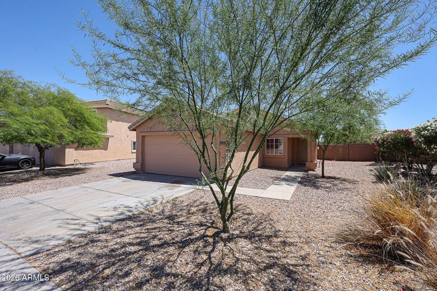 Charming single-level 3-bedroom, 2-bath home offering a functional great room floor plan and ideal north/south exposure. Interior features include slate flooring in main living areas, new carpet, fresh interior paint, and new appliances. The bright kitchen opens seamlessly to the living space--perfect for everyday living and entertaining. Enjoy added comfort with ceiling fans, and a covered patio for outdoor relaxation. Complete with an electric garage door opener and move-in ready condition, this home delivers both value and convenience in a well-designed layout. Brand new garage door with new garage door opener.