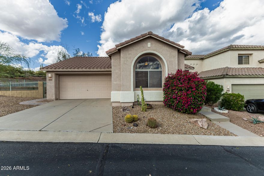 Great low-maintenance home situated on a desirable corner lot in a quiet, gated community. Enjoy beautiful desert and mountain views local wildlife and at night enjoy the city lights. This furnished home, features numerous upgrades, including new flooring in the living areas and kitchen, upgraded stainless steel appliances, new vanities, and updated fixtures and hardware throughout. A move-in-ready home with much to offer.
