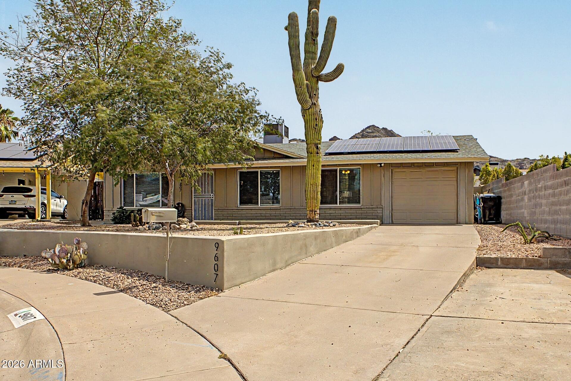 9607 N 15TH Place