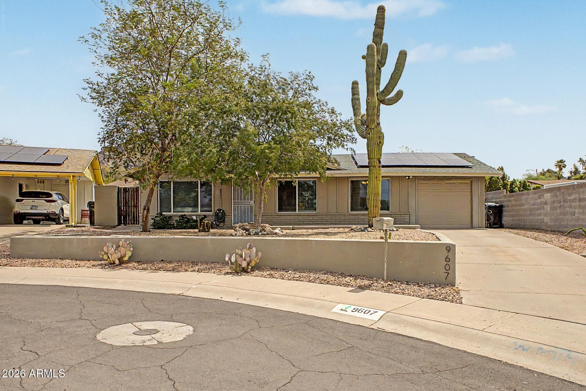 9607 N 15TH Place