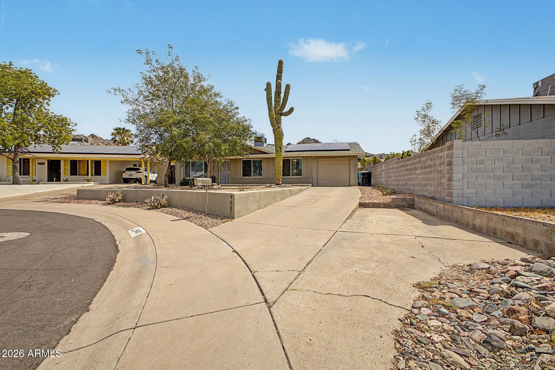9607 N 15TH Place