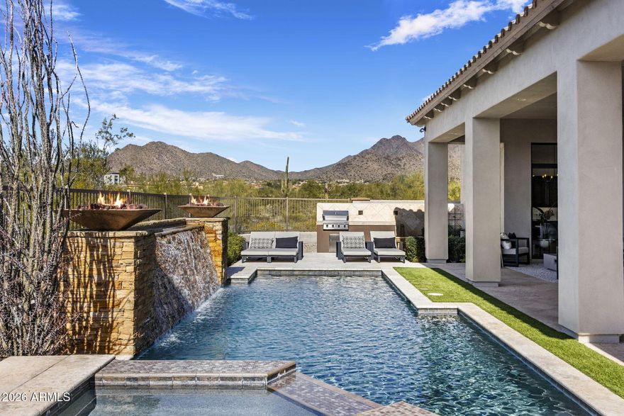 Terrific opportunity in the guard gated portion of Windgate Ranch. This single level, cul-de-sac lot home boasts scenic mountain views of the McDowell Mountains and privacy. Open floor plan that seamlessly integrates living spaces, kitchen, and outdoor living making it ideal for intimate occasions and entertaining guests. This home is available turn key, should furnishings be desirable. This home has to many features to list and is a must see. Car collectors will appreciate the 4 car garage. The community offers multiple amenities including pool/spa and sport courts. Close proximity to hiking, restaurants, retail, grocery, banking, health care, fueling stations and freeway access. Don't miss out this opportunity won't last.