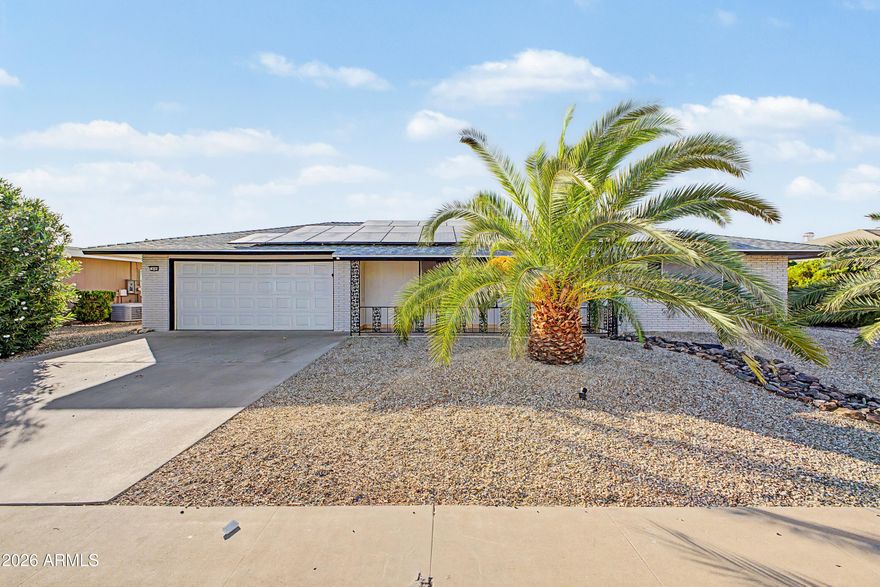 Welcome to this clean, move-in ready home in the heart of Sun City, a premier 55+ active adult community. This spacious home features 3 large bedrooms, 2 bathrooms, and a large addition that creates an open and flexible living space perfect for relaxing or entertaining. The open kitchen offers ample cabinetry, counter space, and abundant storage throughout. Solar panels help keep electric bills extremely low, providing energy efficiency and long-term savings. Enjoy low-maintenance landscaping and an active lifestyle with access to golf, pickleball, fitness centers, and scenic walking paths. Conveniently located near shopping, dining, and everyday amenities, this home offers comfort, value, and easy Arizona living in one of Sun City's most desirable communities.