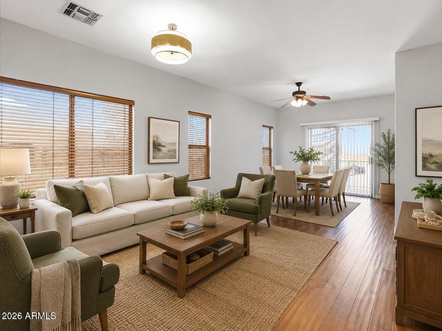 Welcome to this beautiful, spacious and private 2-bed, 2-bath Fountain Hills condo with beautiful mountain and city light views. This bright, open layout features hand-scraped wood floors, tile, and a cozy upgraded kitchen with maple cabinetry, tiled countertops, pass-through, eat-in area, and separate dining space. Enjoy rare dual balconies, including one extra-large private balcony perfect for sunrise, sunset, and desert views. Additional highlights include double-pane patio doors and windows, full-size garage with opener, workbench, cabinets, and all appliances included. Low HOA and low maintenance. Close to Fountain Park, restaurants, shopping, and golf. Ideal full-time home, winter retreat, vacation home, or rental.