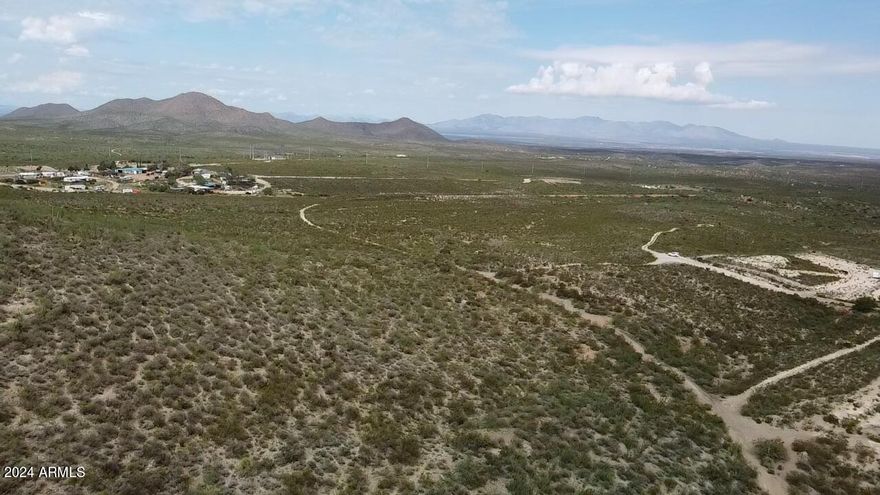 28 Rolling acres inside of Tombstone city limits close to two large hotels. This property is perfect for hospitality or your unique needs. Just a minute drive into Historic Tombstone and all that it has to offer. B2 zoning allows for a multitude of uses. Horses ok with access to trails from Lonely lane. Build your dream home on this one of a kind property or start your very own cowboy ranch.