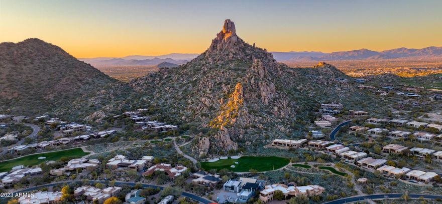 The iconic world class country club of Desert Highlands is nestled at the base of Pinnacle Peak with the highly acclaimed Jack Nicklaus 18 hole, par-72 signature course ! All remodeled w/only the most luxurious of custom finishes throughout. Disappearing glass wall sliders, rich solid wood flooring, top of the line appliances, two dishwashers, custom cabinetry throughout home, fully equipped wet bar, Master wine cellar, his and her separate offices, master wing, attached casita, single level, newer roof and AC. Sprawling resort area with newly refinished pool/hot tub. Disregard days on the market, pool was under construction through August, 2023. One of only a few private lots set back from grass tennis courts.  Live the AZ Lifestyle!