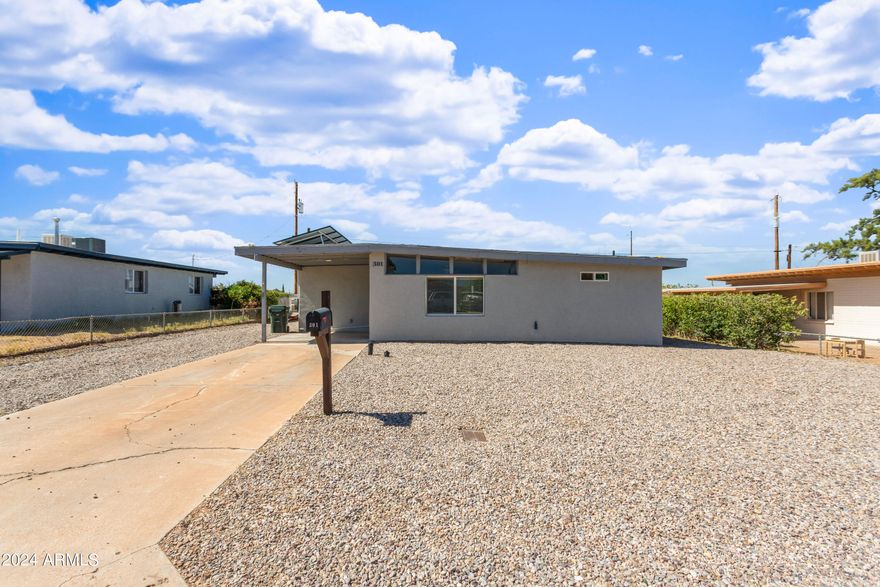 Updated and beautiful is what you will see when you walk into this home. Open space from living room to kitchen to dining room. Laundry room is located inside. 2 bedrooms and 2 bathrooms. Bonus room you see can easily be a 3rd bedroom, great room or so much more. New drywall, electric, plumbing, gas, insulation in addition to the pretty updates to the floors, kitchen and bathroom. Solar panels to assist in the electric cost is a big plus too. You won't regret stopping by this one and calling it home.