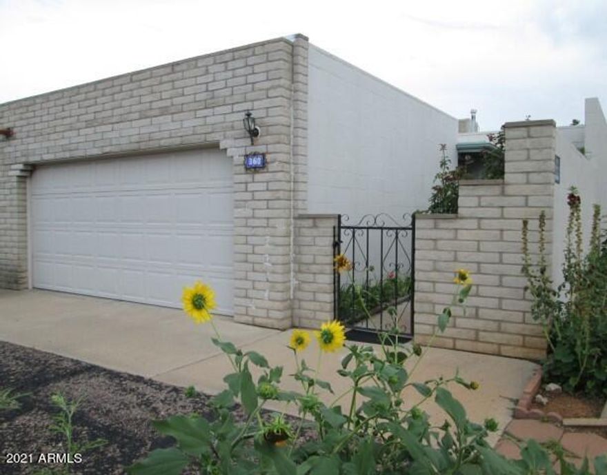 This is the perfect home for you! Stay all year or make this your seasonal get-away. Enjoy your morning brew from the peace and quiet of your own private backyard oasis. Convenient to Sierra Vista shopping and medical care. This home features easy-to-no upkeep of the grounds. One level with handicap width doorway into the master suite. Separate laundry room, good size kitchen with pantry closet and 2 car garage. Call for a private tour today!