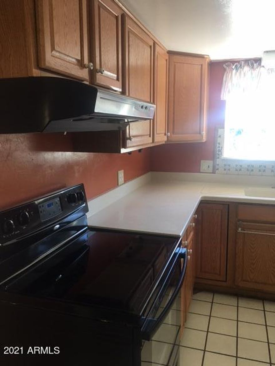 A cozy and sound home on half acre of beautiful yard. 3 Bed -2 bath with Arizona room . Beehive fireplace in living room. Sheds for workshop or storage , more storage at end of carport also. Come see and submit all offers!