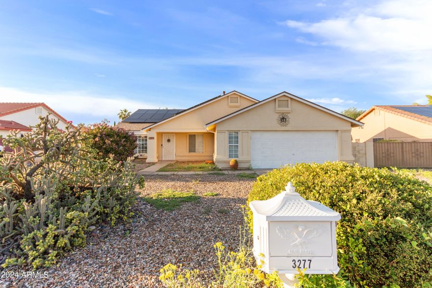 This spacious 3BR/2BA/2.5CG, 1923 sq.ft. home is in the very desirable Country Club Estates in Sierra Vista, AZ minutes from Fort Huachuca, shopping, schools and Canyon Vista Medical Center.   You will love this open floor plan and all the natural light this home has to offer.  You can cozy up to the gas-log fireplace in the large great room with vaulted ceilings.  The home includes a large backyard with covered patio that is perfect for entertaining and also includes a storage shed.  This home sits on a large .267 acre lot which includes an RV gate perfect for the toys.  Newer (2022) Roof! Seller is willing to pay off solar with a full price offer!