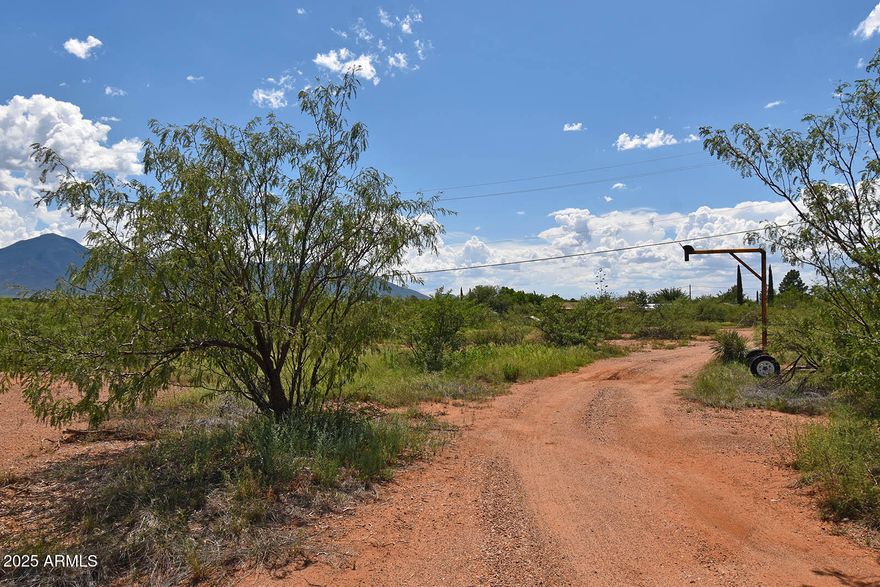 Frontage lot along Naco Highway, zoned SR-12. Utilities nearby include gas, power and city water. Buyer to verify utilities available to lot. Nice views to Bisbee and surrounding hills. Develop today or hold for the future. Could be useful for contractor's yard or similar application. Please check Cochise County zoning ordinances for intended use.