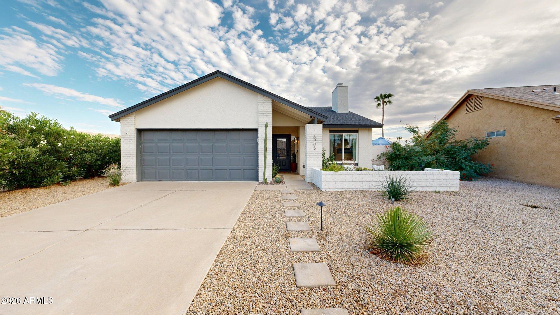 6905 E KELTON Lane