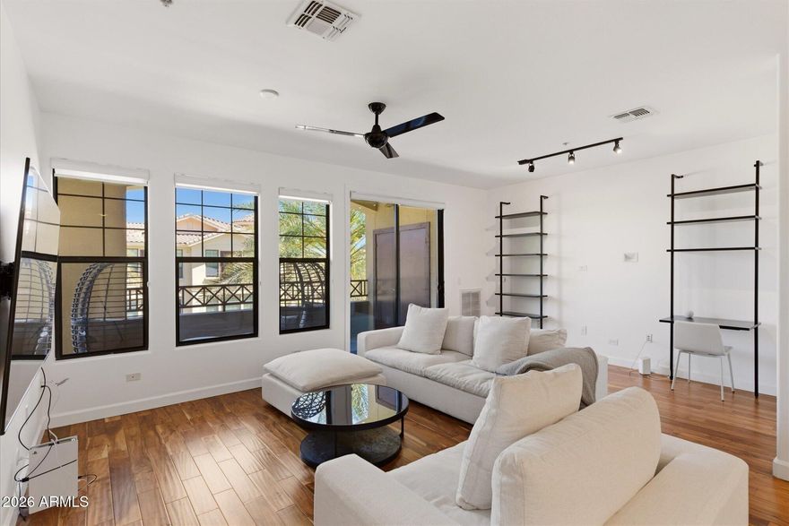 Very motivated seller!!! Enjoy resort style living in this beautiful condo, just minutes from Old Town Scottsdale, dining, shopping, golf and entertainment! This spacious 1 bedroom, 2 bathroom residence features an open layout that provides a generous living and entertaining space. It's complemented by abundant natural light and a seamless indoor-outdoor feel. Enjoy a cup of coffee in the morning or a glass of wine at night, on your balcony overlooking the gorgeous pool area! This is a perfect full time residence or lock and leave opportunity, don't miss it!