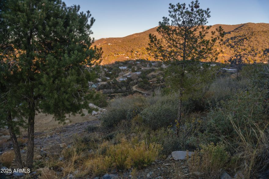 Beautiful .47-acre lot in a peaceful Prescott setting with expansive views. Gently elevated
and ideal for a custom home with space for outdoor living. Minutes from downtown, shops,
dining, and year-round recreation. The perfect blend of privacy, convenience, and natural beauty.