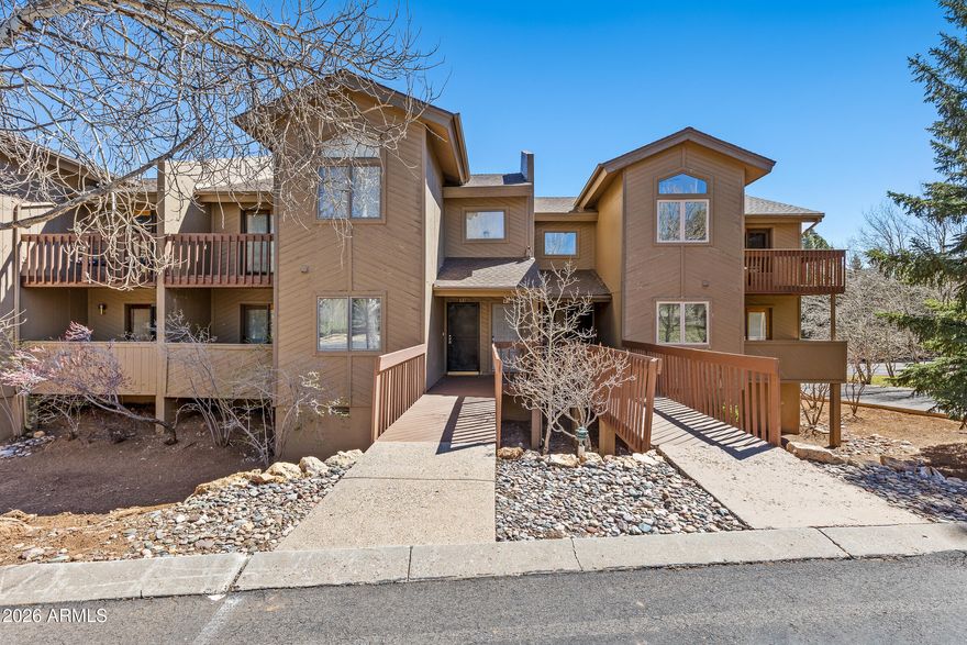 Welcome to this thoughtfully maintained 2-bedroom, 2-bath condo in the highly desirable Continental Country Club. The living space is warm and inviting, centered around a cozy fireplace that adds the perfect mountain touch.

The main living area opens to a private deck, offering a peaceful spot to relax and take in Flagstaff's cool evenings. The kitchen features a functional layout with ample cabinetry and storage, making everyday living easy.

The primary suite offers patio access and serene views, creating a quiet and comfortable space to unwind. A well-designed floor plan provides flexibility whether you're living here full time or using it as a getaway.

Residents enjoy access to golf, a clubhouse, pool, tennis courts, and nearby trails, all just minutes from shopping dining, and downtown. Offered fully furnished!