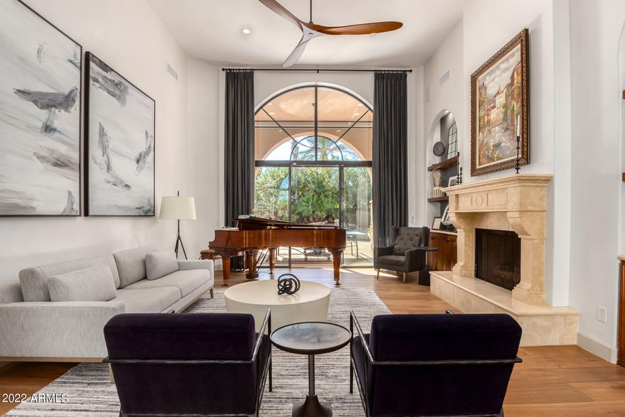 This remodeled gem in the guard gated community of Cheney Estates invites you in with a clean, crisp aesthetic.  Almost very space was reimagined in 2020.  White oak engineered wood floors, walls of glass, new modern fireplace in the family room with an incredible wet bar with a two-beer tap kegerator, ice machine, & frige. Sonos system thru-out. Gorgeous custom Burdette kitchen cabinets with top of the line appliances & wine chiller.  The primary bath!  The dreamy stand-alone soaking tub and steam shower with Aroma and Chroma therapy along with sound system will calm your spirit.  Enjoy the incredible ''Boutique'' closet! Three fireplaces inside, one out.  Speaking of outside!  Wait until you see the Ramada built for entertaning w/ FP, Gas heaters, ceiling fan, Sonos surround system w/ speakers, another Kegerator and BBQ Island! Fountain, pool, spa, epoxy garage.  Smart electric window coverings in primary bedroom and bath, family room, kitchen, and breakfast nook.  Custom draperies.   Community tennis and Pickle ball courts are right across the street!  This home is a dream come true.