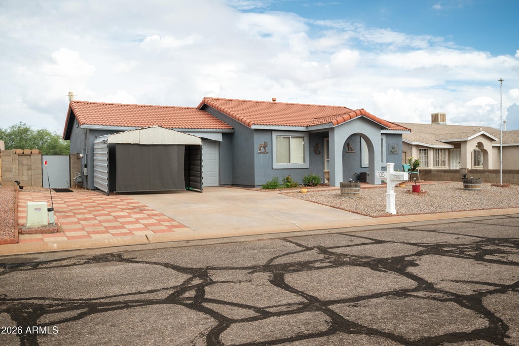Photo of 105 Arrowhead Drive, Huachuca City, AZ 85616 (MLS # 7056467)