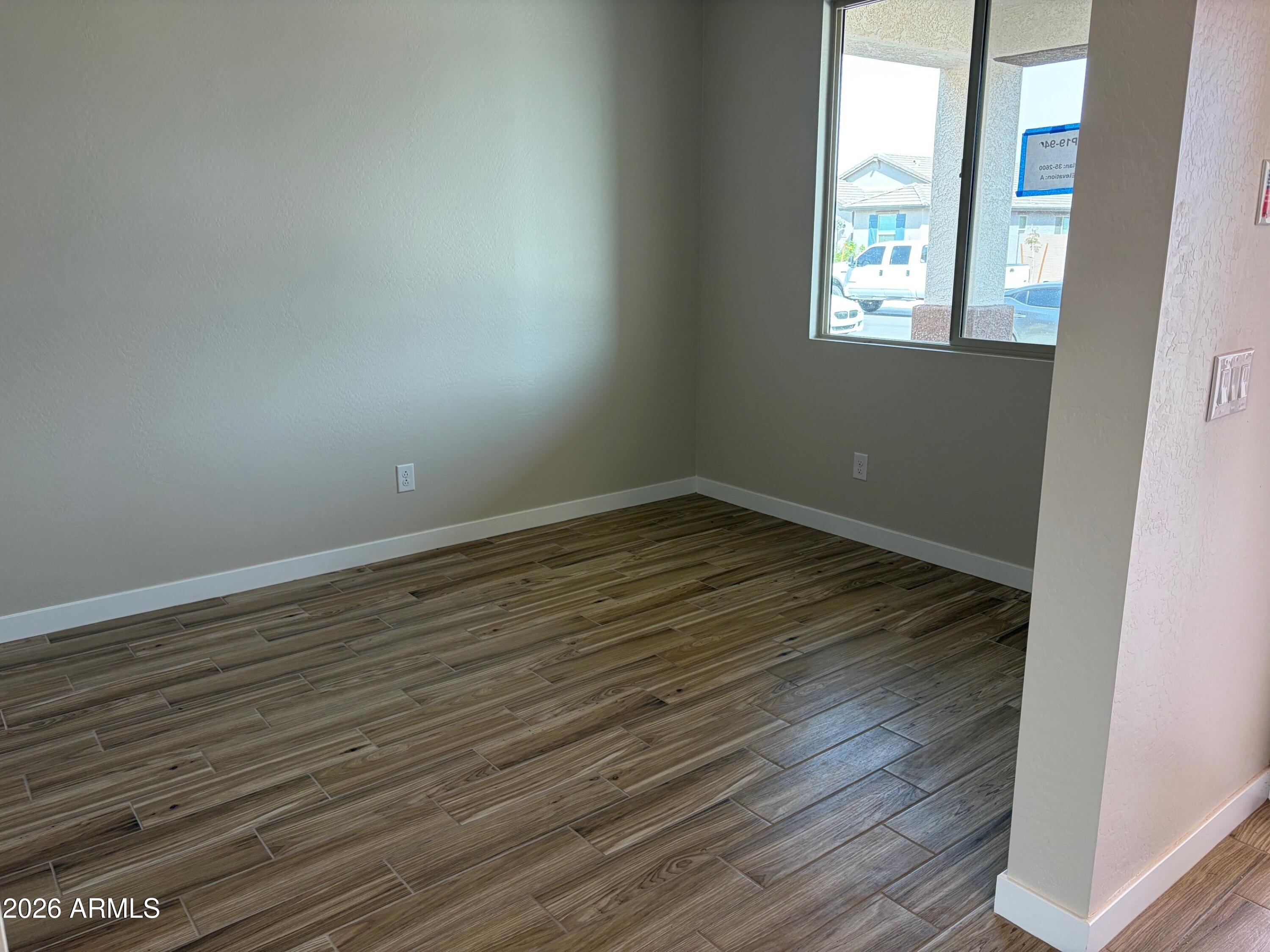 7271 E CATTLE CALL Street