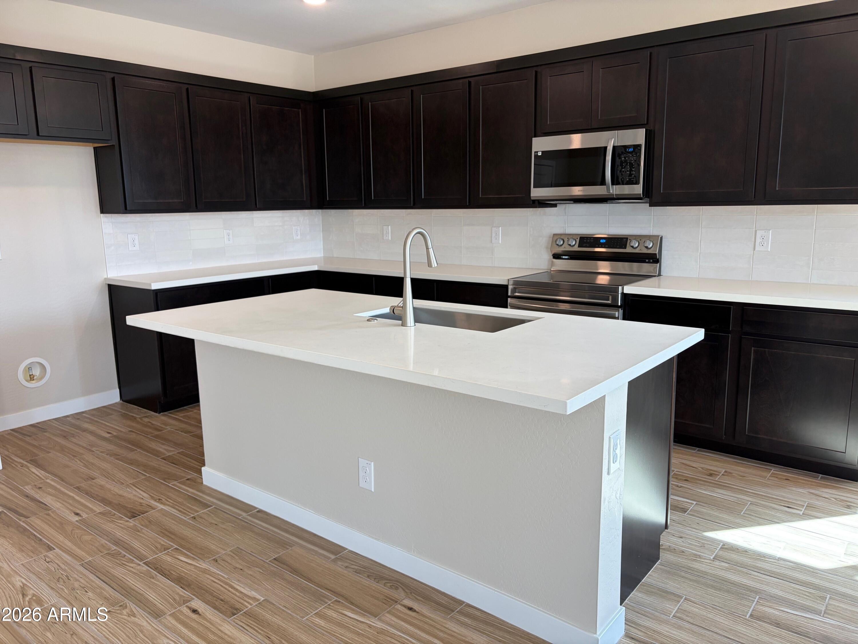 7271 E CATTLE CALL Street