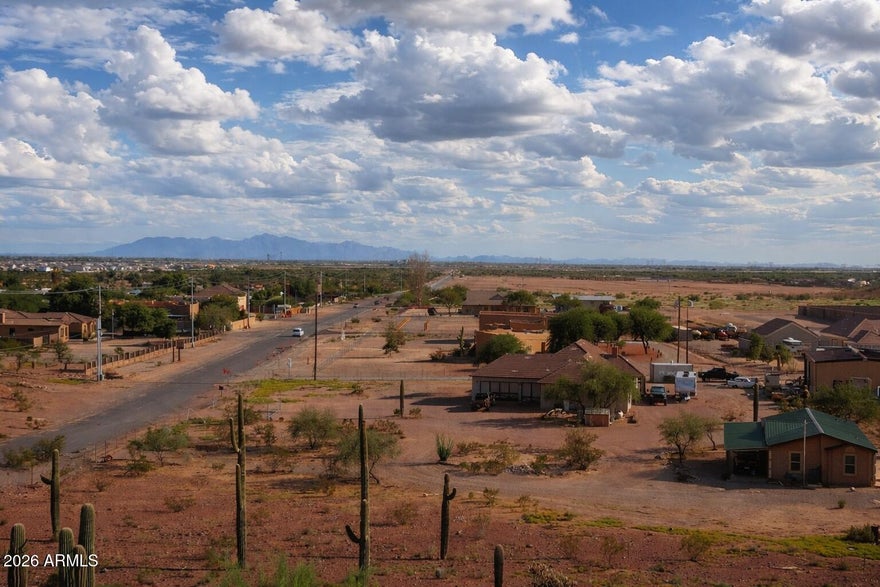 Build your custom dream home on this premium 1.01-acre R-1 lot located in a rapidly growing area of the West Valley. This property offers breathtaking mountain views and stunning city light views, creating the perfect backdrop for a luxury custom build. With easy access just minutes from Loop 303 and the US-60, you get the ideal balance of privacy and convenience.

This is a prime opportunity for builders, investors, or end users looking to create something truly special in an area seeing strong development and appreciation. Shared well on site. Buyer to verify all material facts including utilities, zoning, schools, taxes, and any hillside or building requirements.