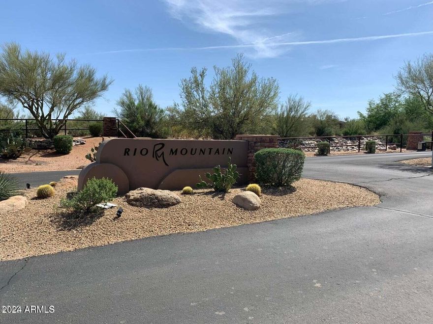 Enjoy spectacular mountain views in the Gated Community of Rio Mountain Estates! This is one of the fastest growing areas of Scottsdale. All custom homes in this subdivision. Community infrastructure is a big plus and Rio Mountain Estates has it all. Drainage, culverts, paved roads with curbing, utilities and electronic gates. All homes are on one acre or more. Level lot making for an incredibly easy build. Much less sitework compared to others. This community also has a less onerous HOA that encourages neighborhood enhancement! Trailheads close and minutes to Bartlett Lake. Nearby restaurants and shopping with more development in the works. Perfect for outdoor and golf enthusiasts! Views of Four Peaks, Troon Mountain, Elephant Butte and Pinnacle Peak! $1M+ homes all around.