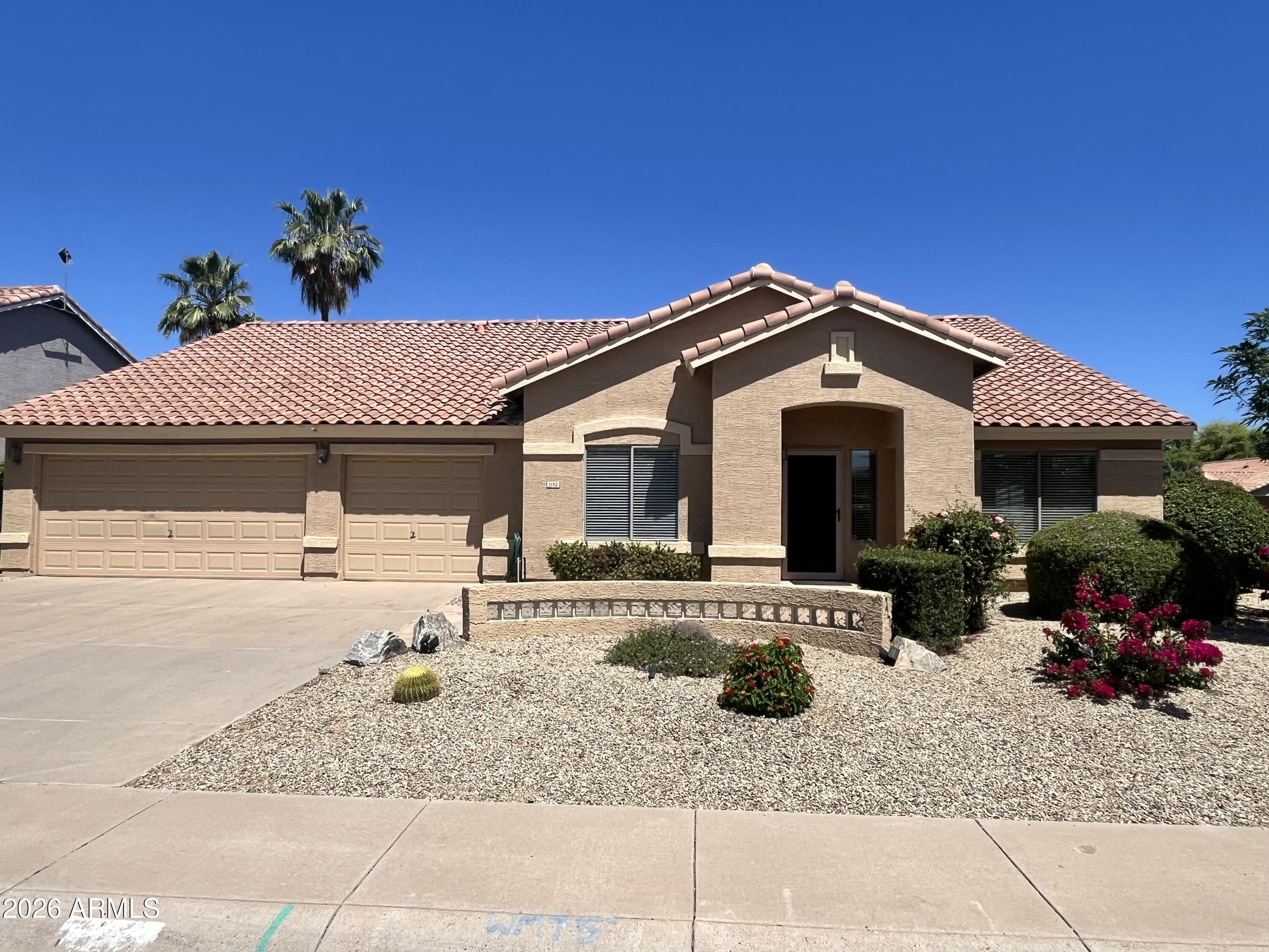 1182 E HARRISON Street