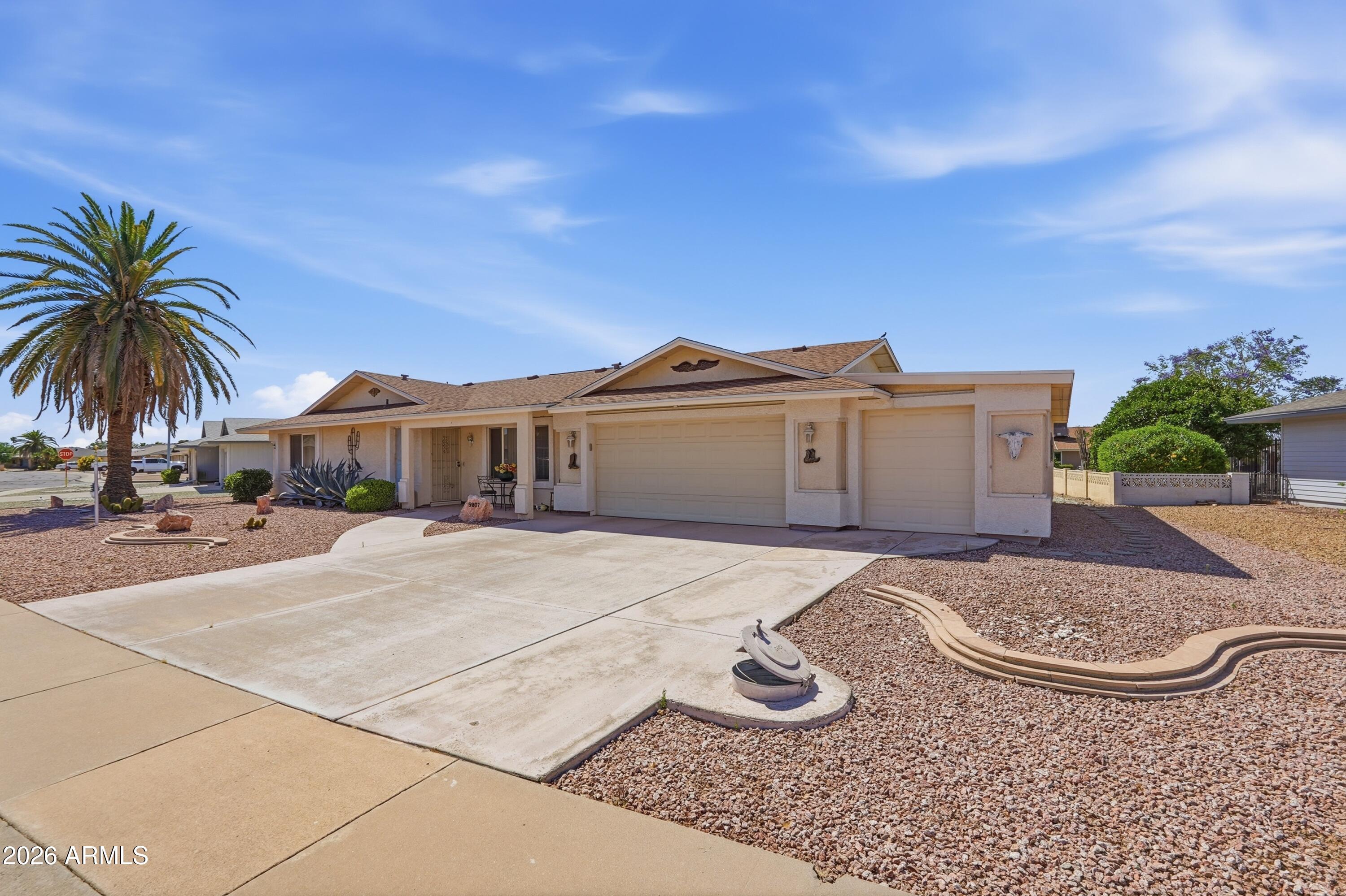 9807 W Mockingbird Drive