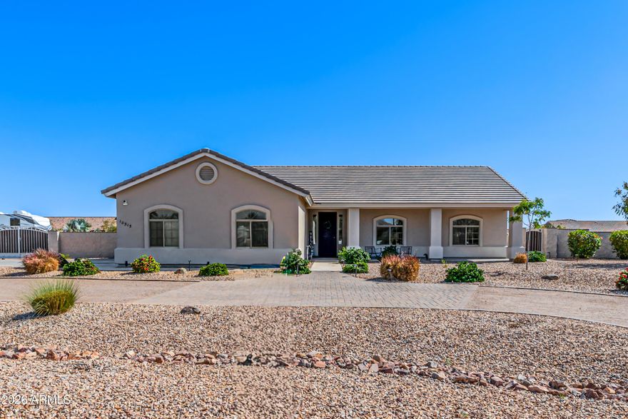 Welcome to this beautiful 4-bedroom, 2-bath home, perfectly located in a prime location with easy access to I-10 and Central Arizona College. Step inside to discover an open concept floor plan, featuring modern finishes. The kitchen is perfect for entertaining. The open-concept design flows seamlessly into the spacious living and dining areas. The backyard features a large covered patio with pavers and synthetic grass. The rest is a clean slate for all your landscaping ideas. . Do not miss your chance to own this gem.