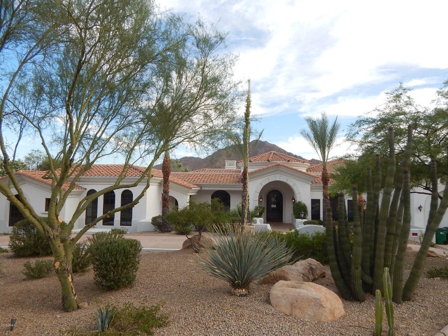Come see this beautiful custom 6 bedroom/7 bath estate located in the heart of Paradise Valley with views of Camelback and Mummy Mountain.  The kitchen includes, a large island, upgraded appliances, counters, and cabinets. The south facing backyard features a negative edge pool/spa, built-in BBQ, fire pit, basketball court all while enjoying a great view of Camelback Mountain. Built to entertain with a theater and game room. Guest suite.  Offered at below appraised value at great price per square foot.  Alarm activated.  Contact listing agent to schedule appointment.