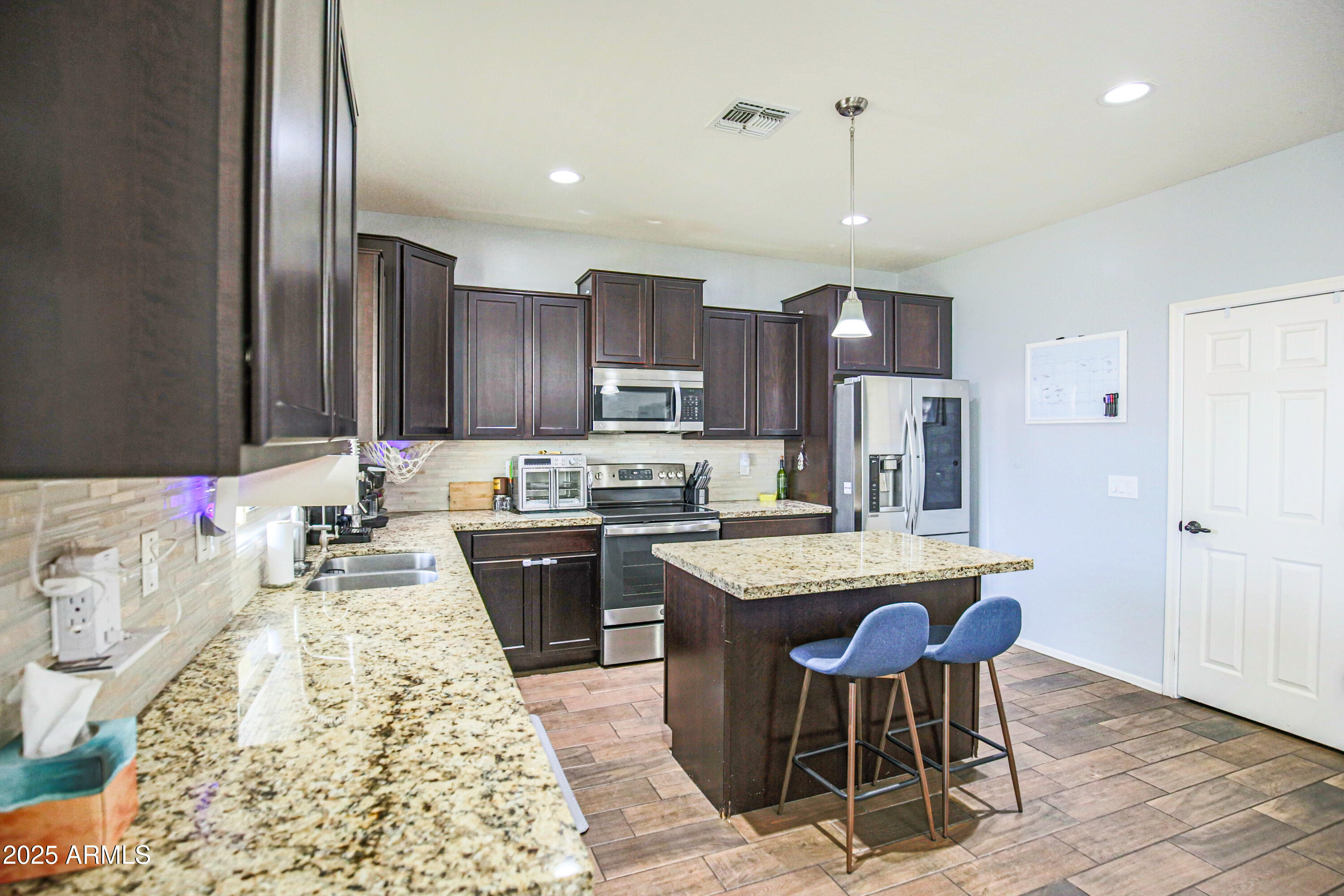 6749 W CHARTER OAK Road