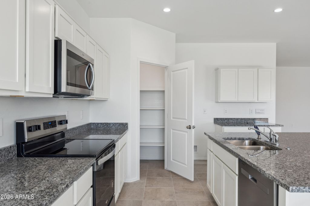 Photo of 1561 E Glazier Drive, Casa Grande, AZ 85122 (MLS # 6977653)