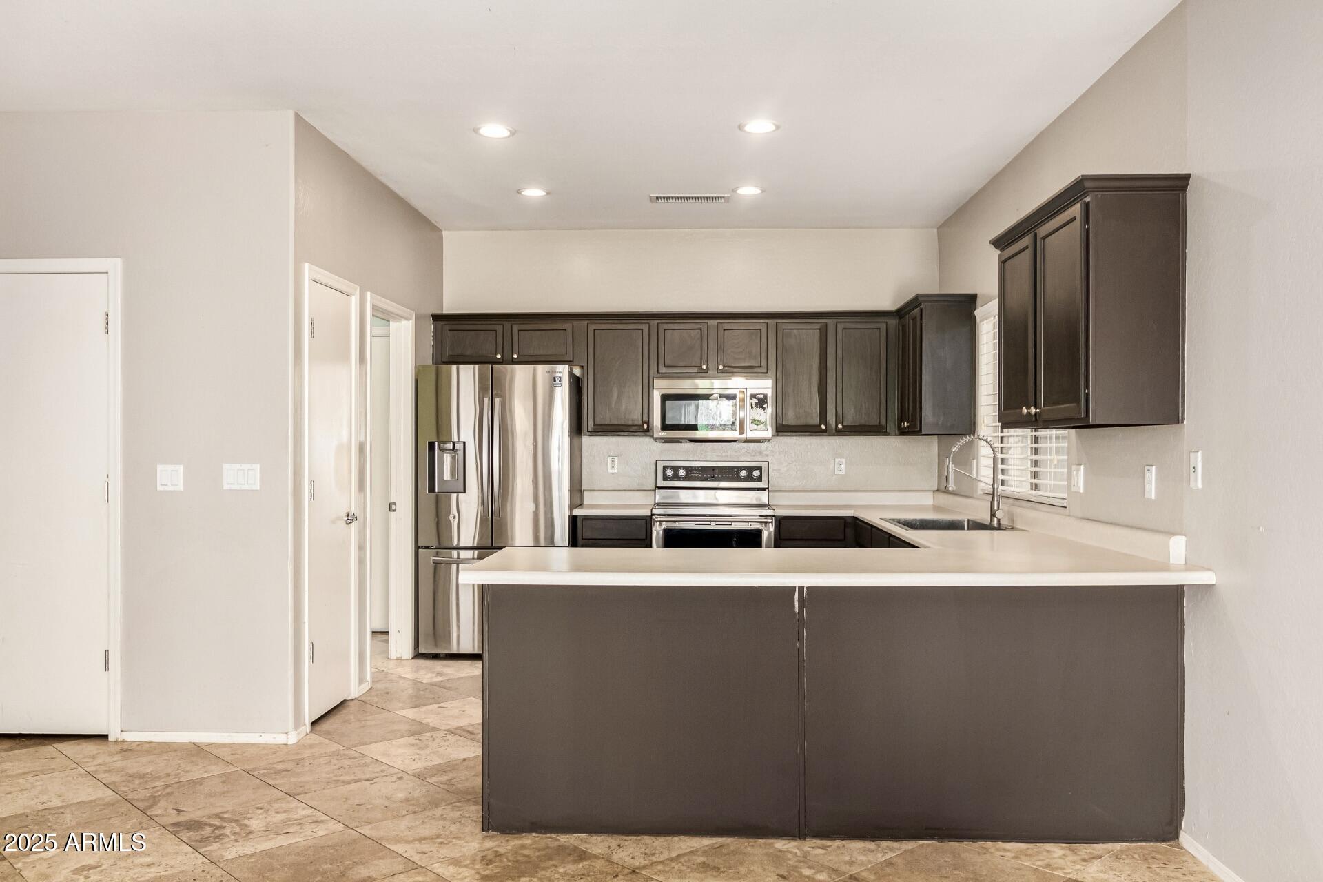 10162 E KILAREA Avenue