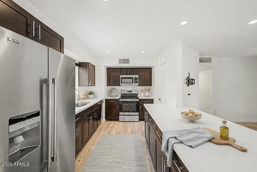 210 E EL CAMINO Drive